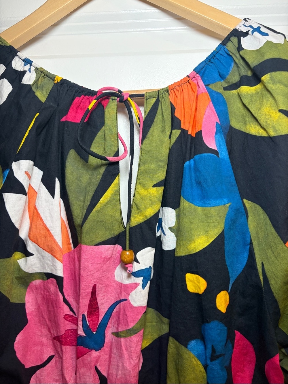 SAYLOR | Black Floral V-Neck Mini Dress with Bright Blooms and Smocked Waist - Picture 6 of 10